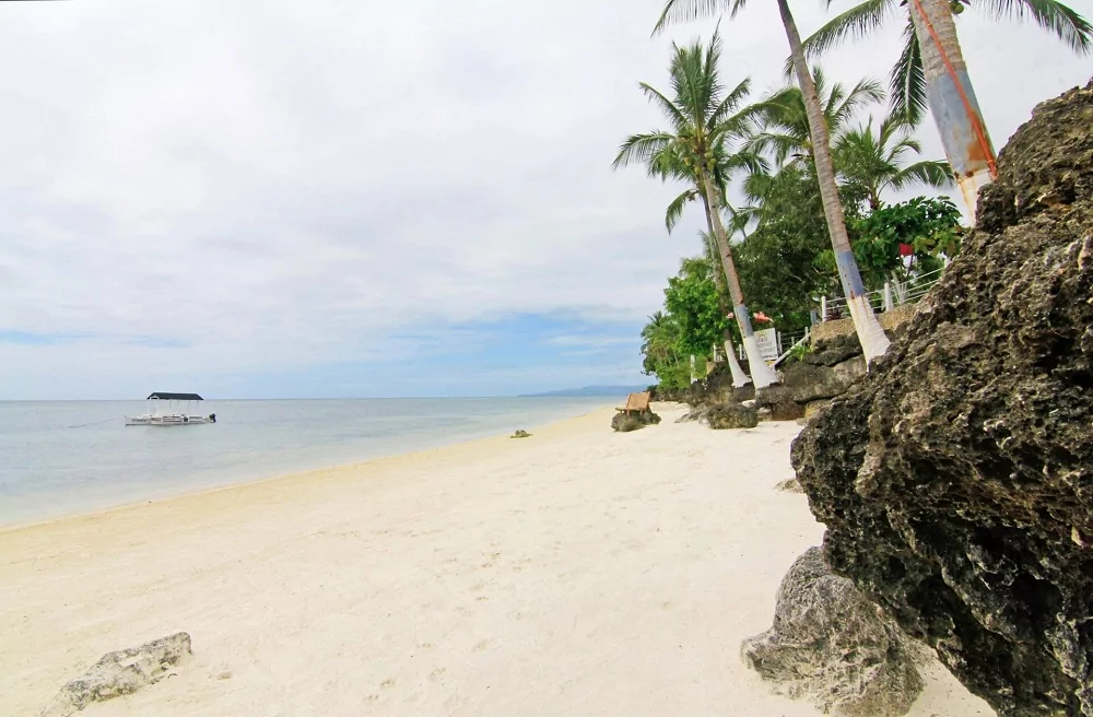 Enjoy a walk at the beach of the J&R Residence in Bohol